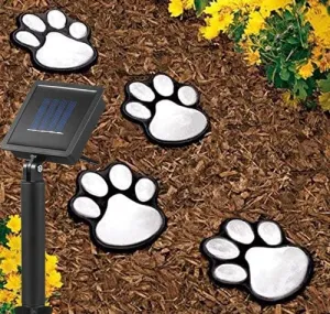 Brand new set of Solar LED Paw Print Lights! Charges by day & shines from dusk to dawn! Easy Install, No outlet required!