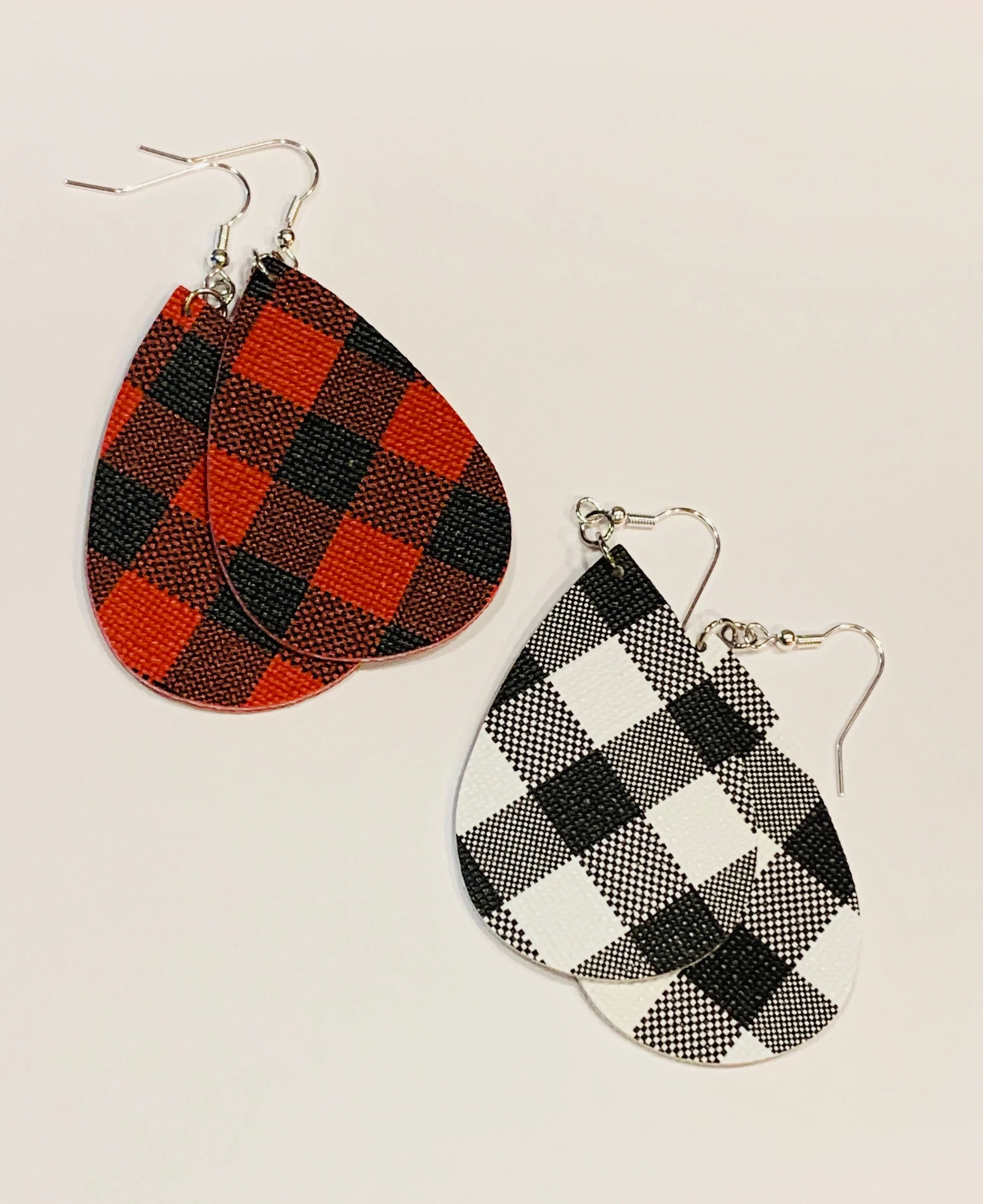 Earrings { Leather } Football. Buffalo plaid. Glitter. Basketball. Baseball. Volleyball. Paisley. Floral. Leopard. Rainbow. Giraffe. $5 jewelry!