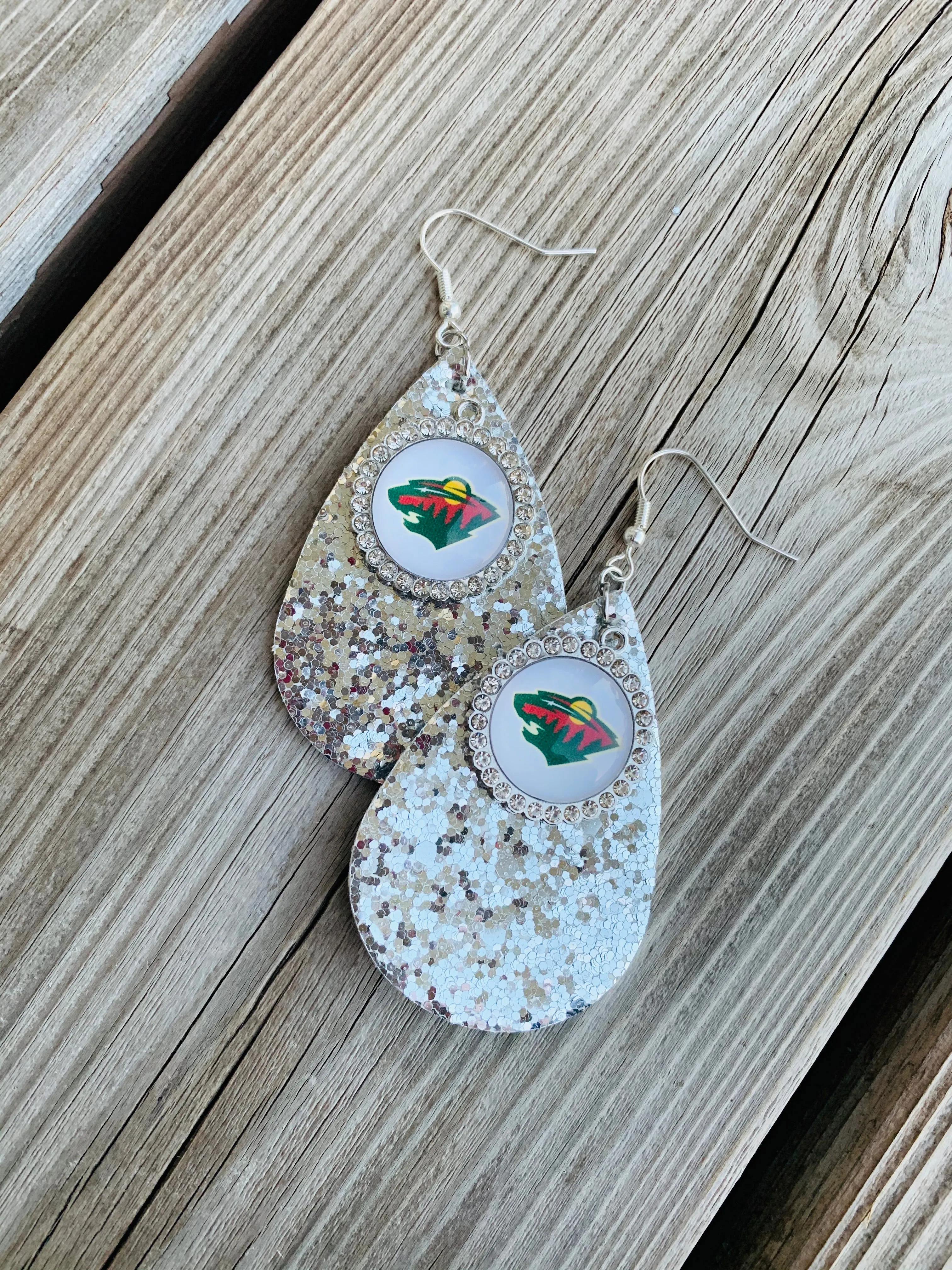 Earrings { Leather } Football. Buffalo plaid. Glitter. Basketball. Baseball. Volleyball. Paisley. Floral. Leopard. Rainbow. Giraffe. $5 jewelry!