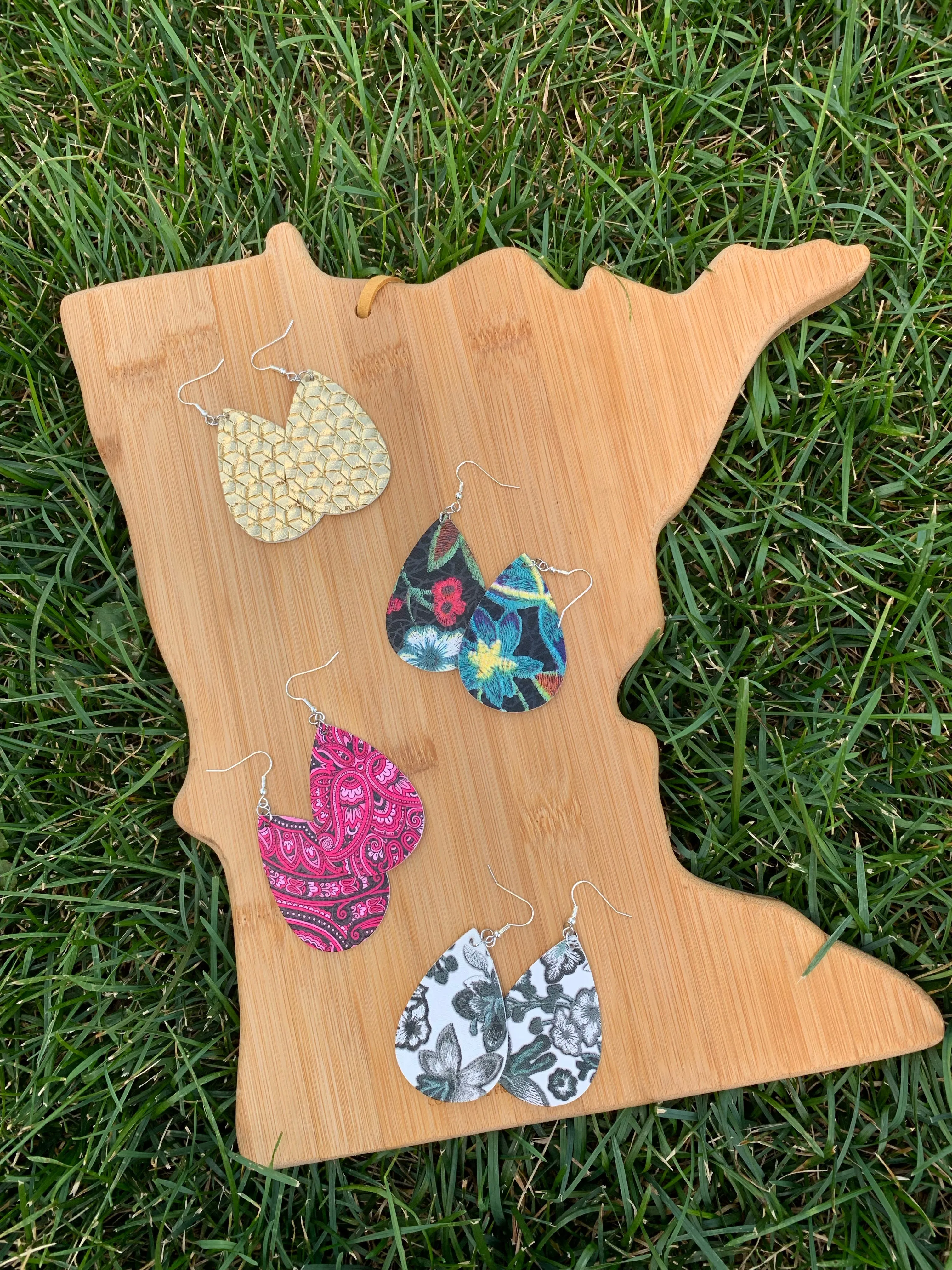 Earrings { Leather } Football. Buffalo plaid. Glitter. Basketball. Baseball. Volleyball. Paisley. Floral. Leopard. Rainbow. Giraffe. $5 jewelry!