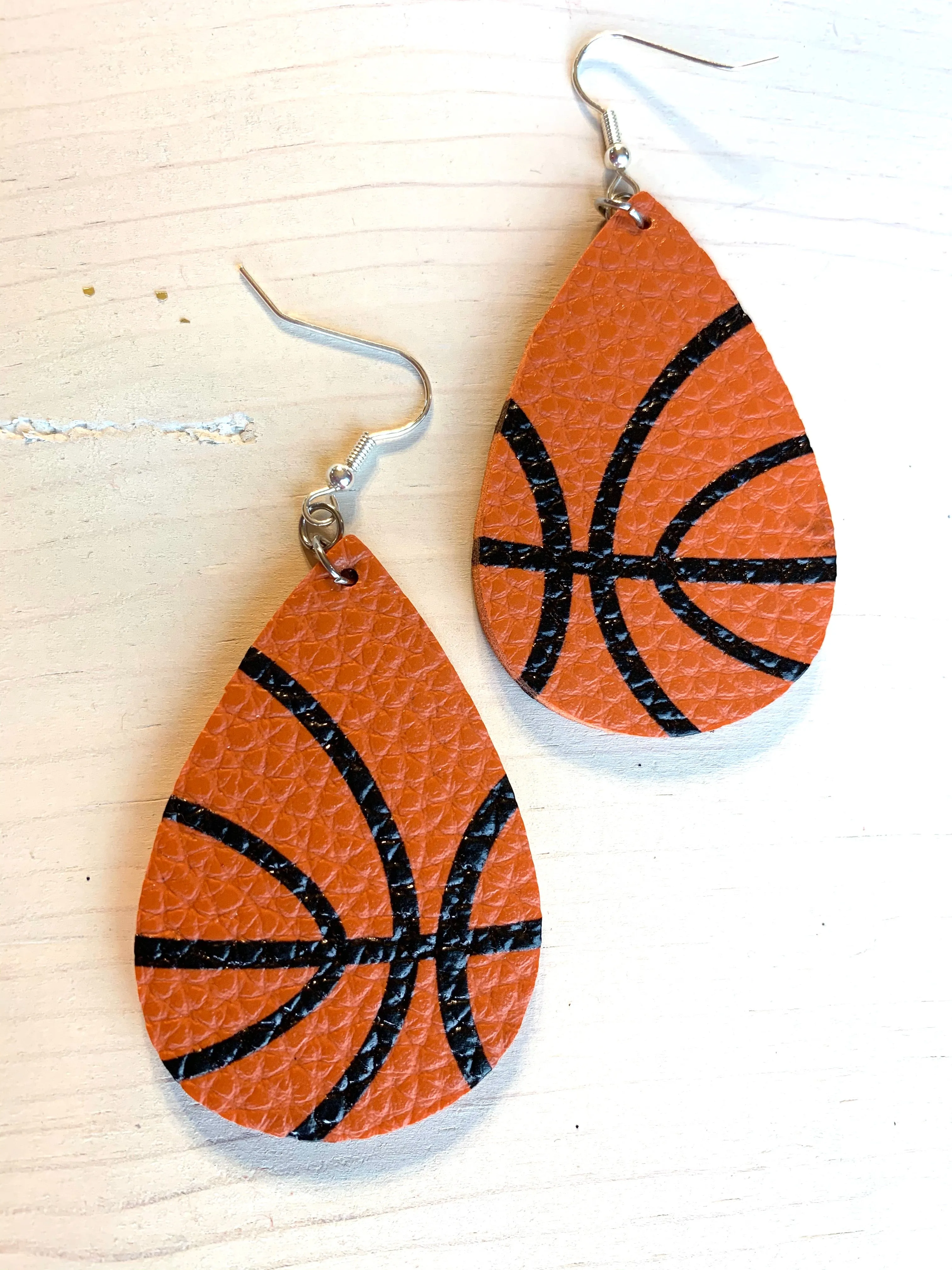 Earrings { Leather } Football. Buffalo plaid. Glitter. Basketball. Baseball. Volleyball. Paisley. Floral. Leopard. Rainbow. Giraffe. $5 jewelry!