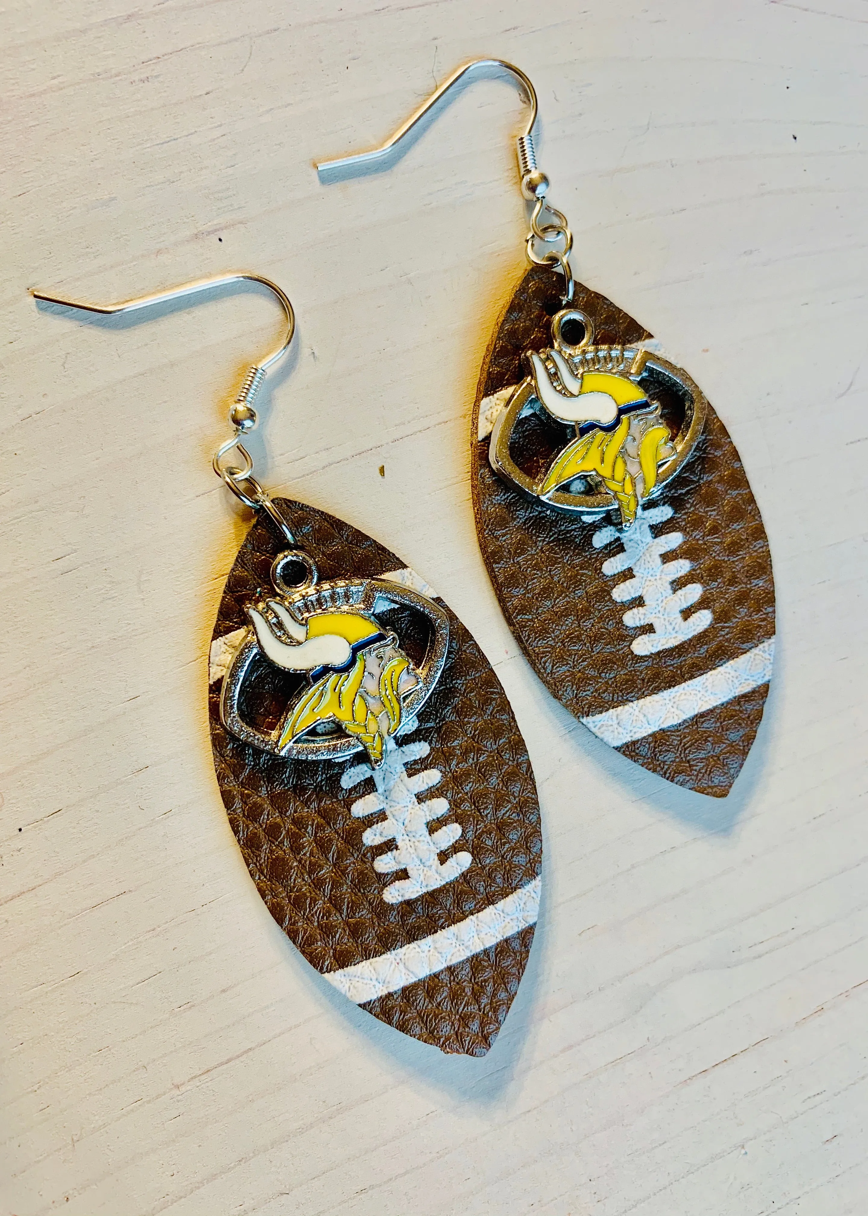 Earrings { Leather } Football. Buffalo plaid. Glitter. Basketball. Baseball. Volleyball. Paisley. Floral. Leopard. Rainbow. Giraffe. $5 jewelry!