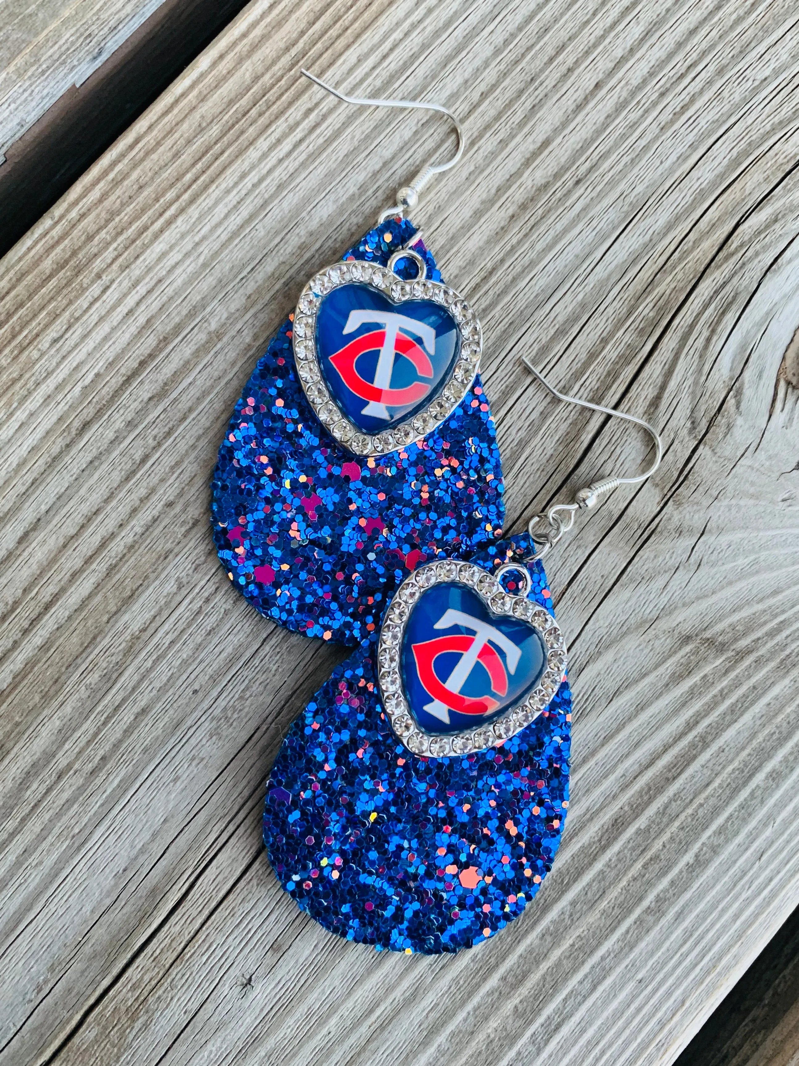 Earrings { Leather } Football. Buffalo plaid. Glitter. Basketball. Baseball. Volleyball. Paisley. Floral. Leopard. Rainbow. Giraffe. $5 jewelry!