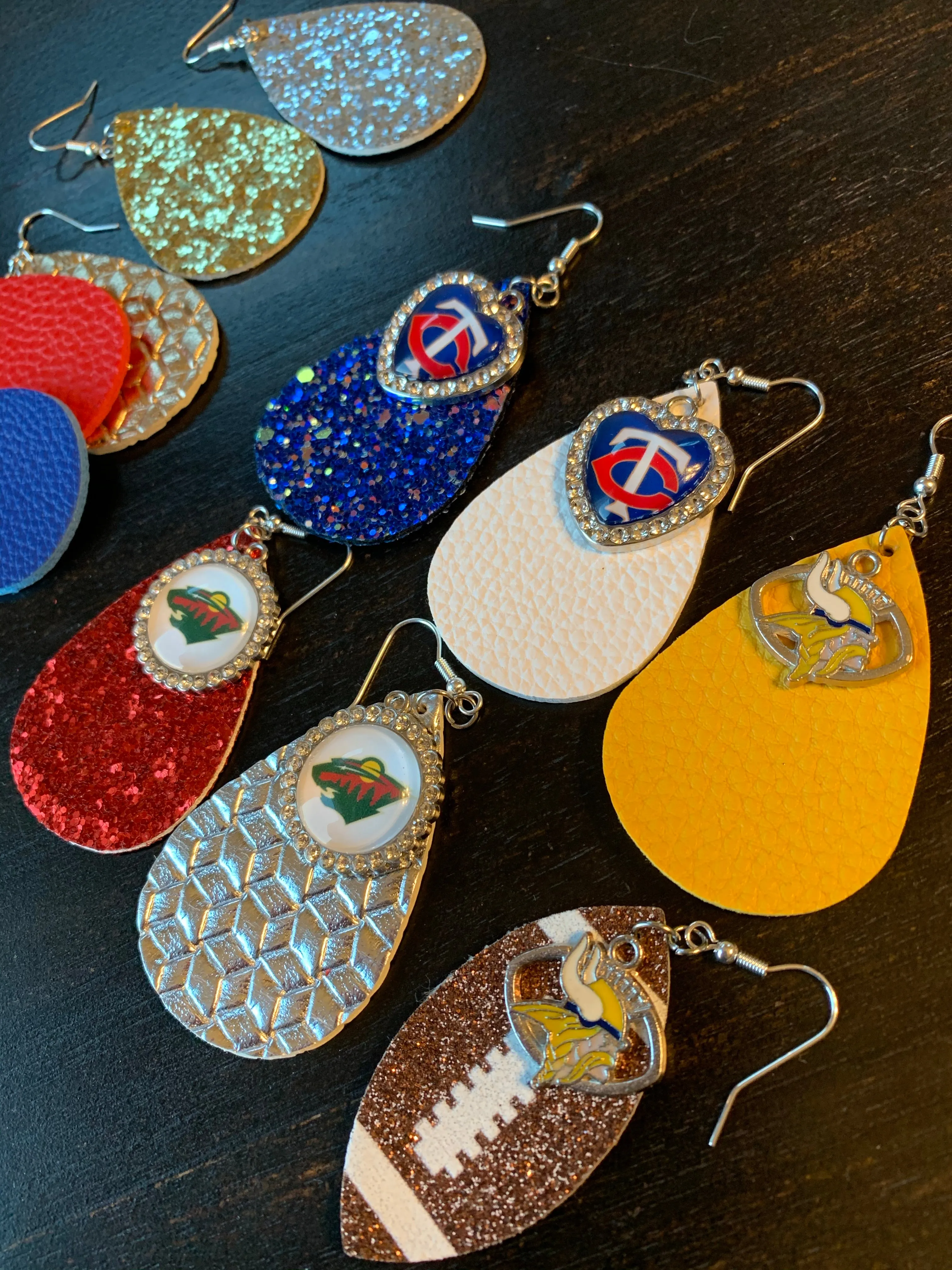 Earrings { Leather } Football. Buffalo plaid. Glitter. Basketball. Baseball. Volleyball. Paisley. Floral. Leopard. Rainbow. Giraffe. $5 jewelry!