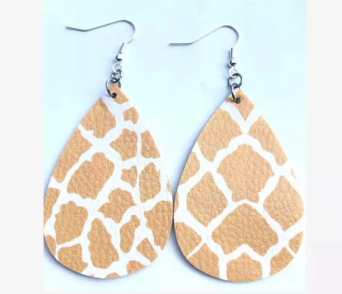 Earrings { Leather } Football. Buffalo plaid. Glitter. Basketball. Baseball. Volleyball. Paisley. Floral. Leopard. Rainbow. Giraffe. $5 jewelry!