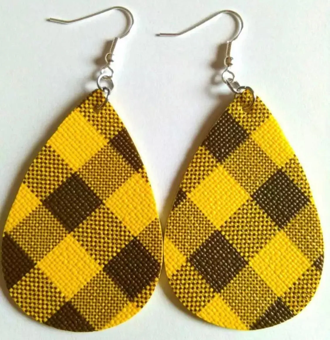 Earrings { Leather } Football. Buffalo plaid. Glitter. Basketball. Baseball. Volleyball. Paisley. Floral. Leopard. Rainbow. Giraffe. $5 jewelry!