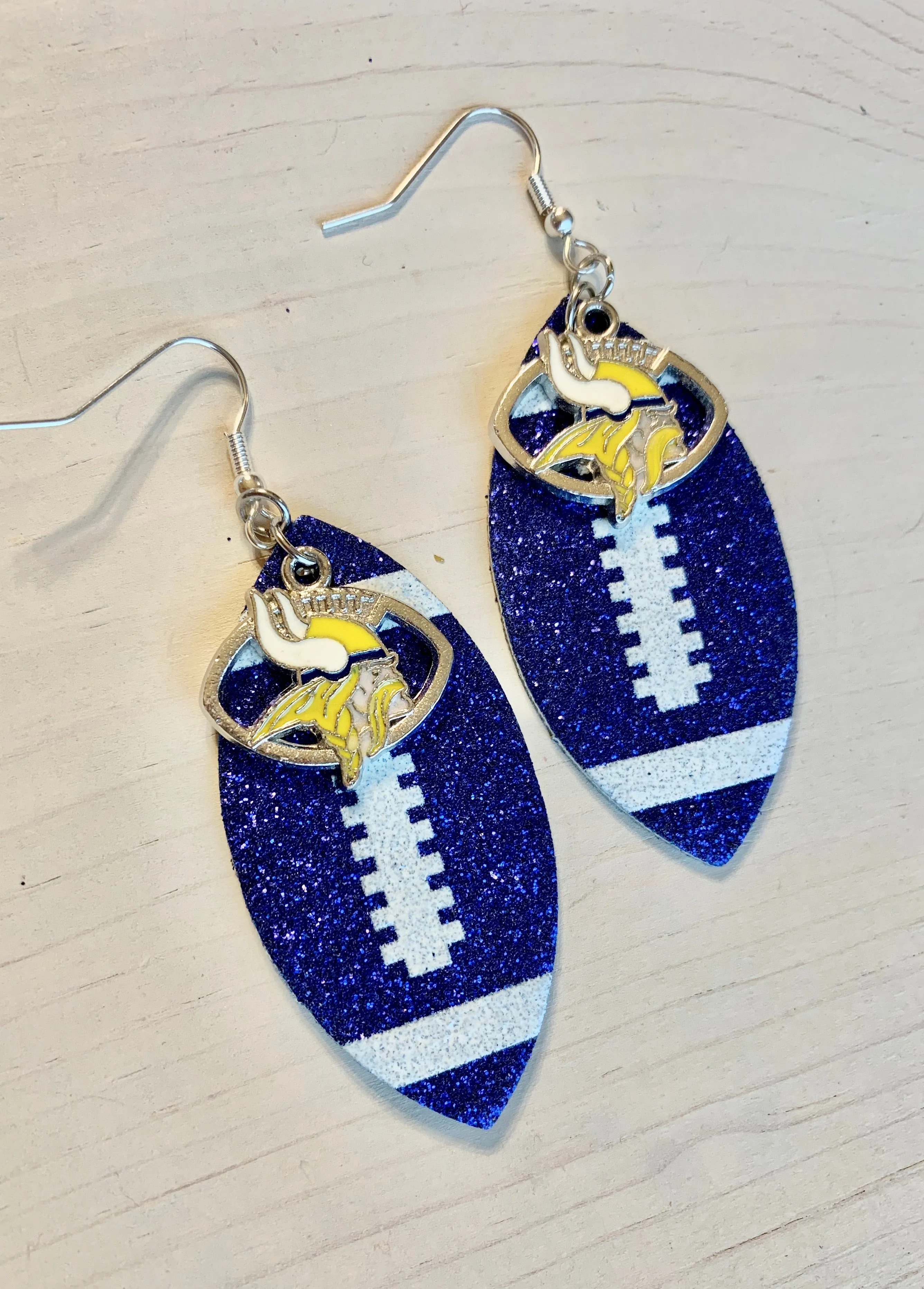 Earrings { Leather } Football. Buffalo plaid. Glitter. Basketball. Baseball. Volleyball. Paisley. Floral. Leopard. Rainbow. Giraffe. $5 jewelry!
