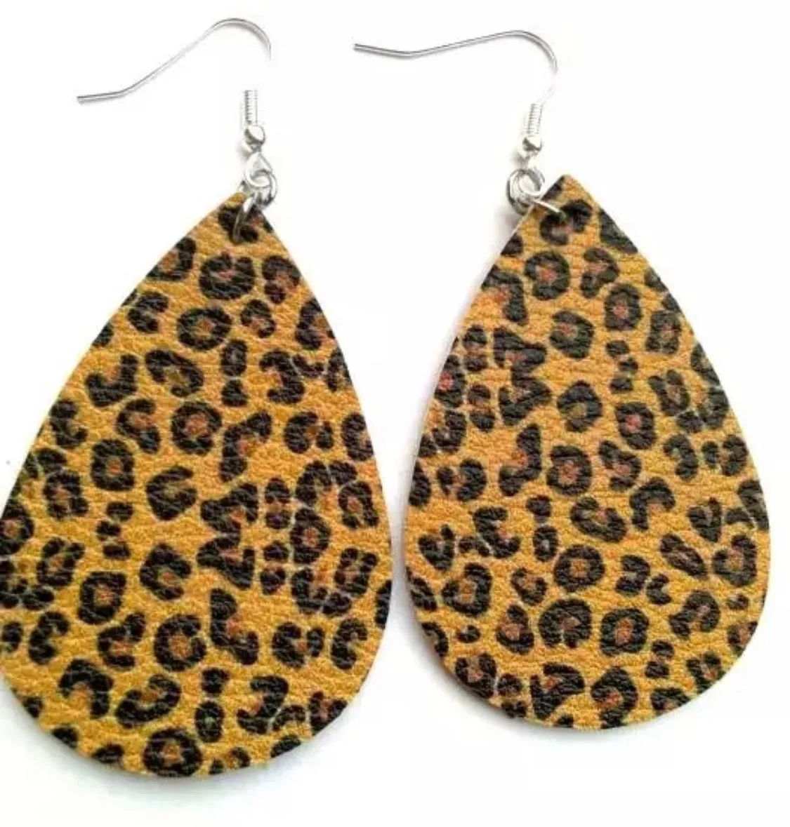 Earrings { Leather } Football. Buffalo plaid. Glitter. Basketball. Baseball. Volleyball. Paisley. Floral. Leopard. Rainbow. Giraffe. $5 jewelry!
