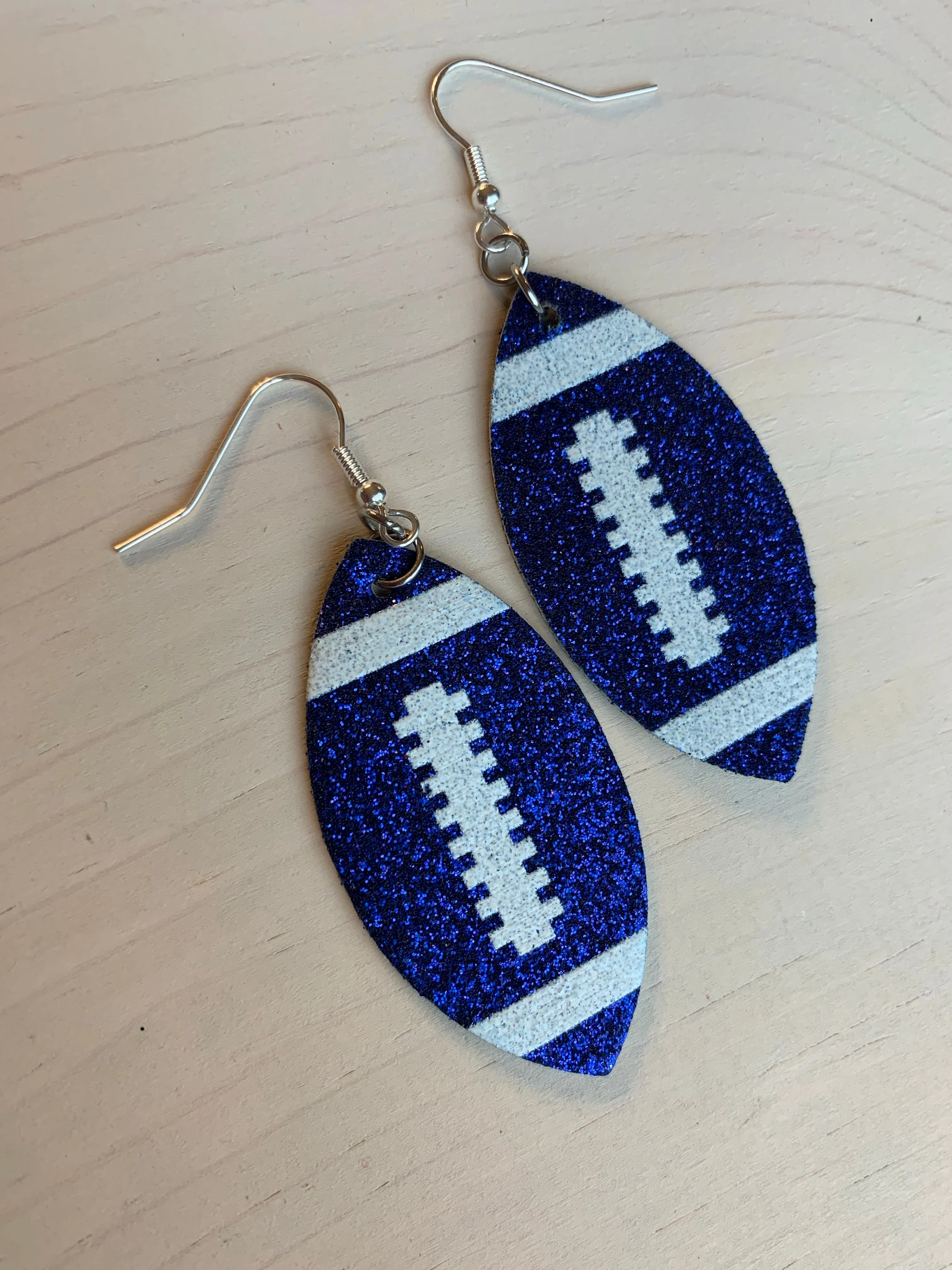 Earrings { Leather } Football. Buffalo plaid. Glitter. Basketball. Baseball. Volleyball. Paisley. Floral. Leopard. Rainbow. Giraffe. $5 jewelry!